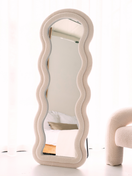 Wavy standing mirror Clara with teddy fabric upholstery