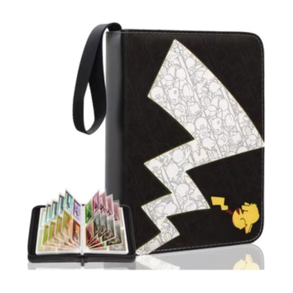 Black Pikachu trading card binder with lightning bolt design, shown closed upright and open displaying colourful cards in…