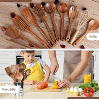 Nine teak wood utensils fanned on wood surface with a whisk; lifestyle scene below shows adult and child chopping vegetabl…