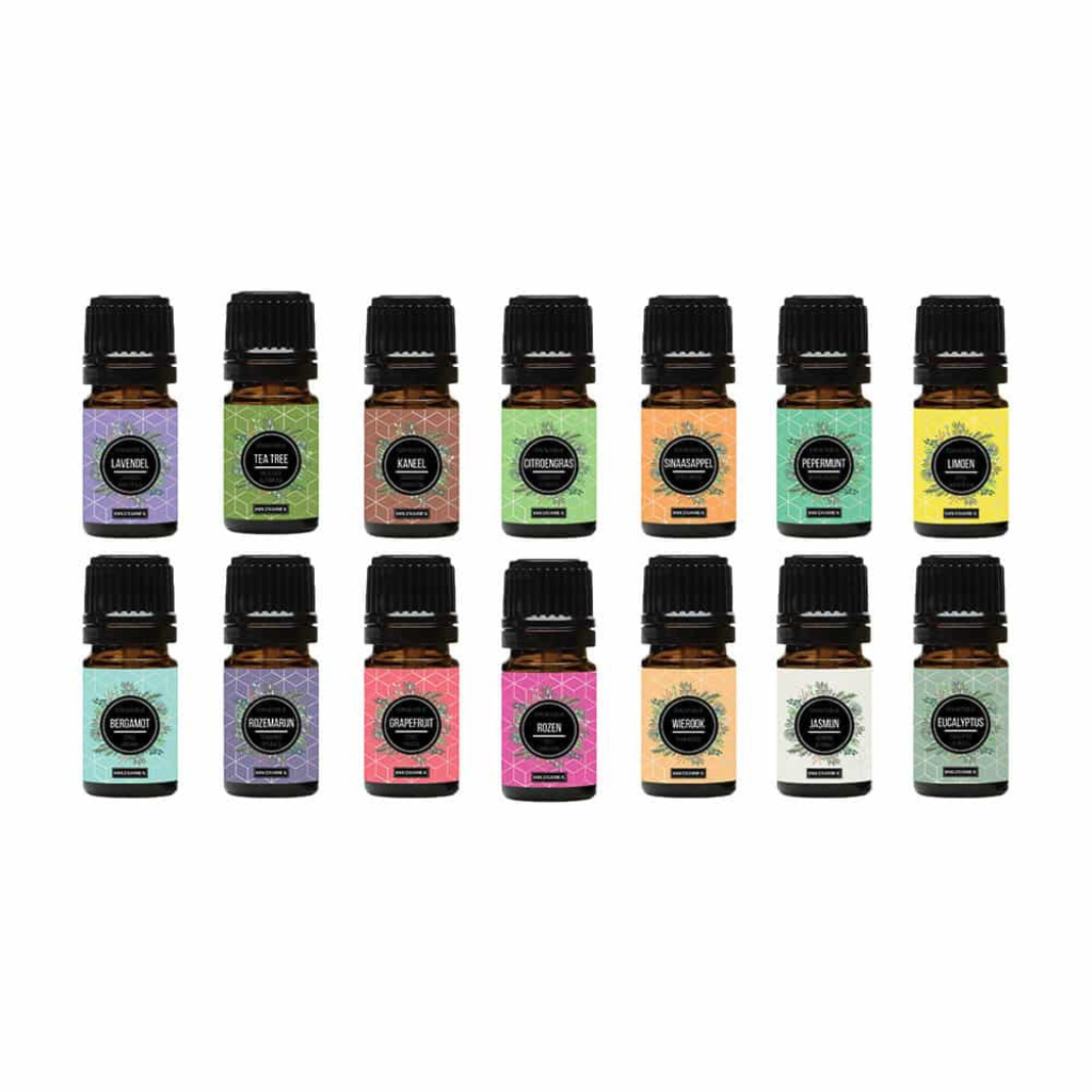 14 small amber glass essential oil bottles in two rows, each with colourful labels including lavender, tea tree, cinnamon,…
