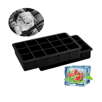 Two stacked black silicone ice cube trays with 15 square molds each, inset detail of clear ice cubes and strawberry frozen…