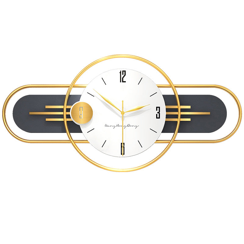 Gold and black modern wall clock with circular face, horizontal oval frame, gold metal hands and decorative stripe accents…