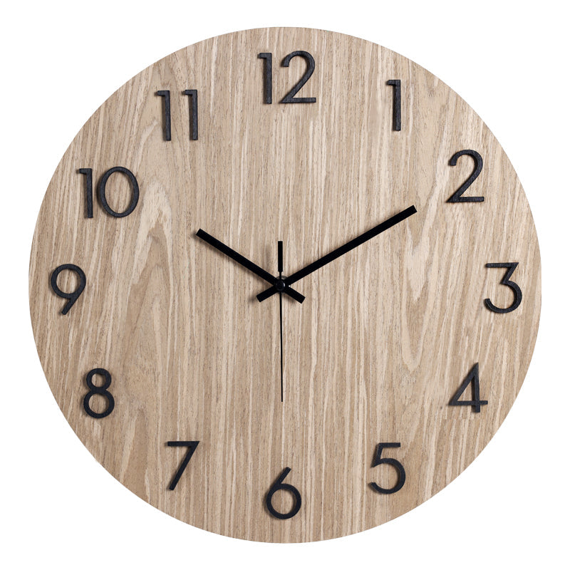Round light oak-finish MDF wall clock with raised black Arabic numerals and black hands, front view, white background