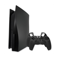 Matte black PS5 disc edition console with replacement faceplates standing upright, alongside two black silicone controller…