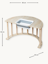 Natural wood semicircular climbing arch with dimension annotations: 90 cm wide, 50 cm tall, 50 cm deep; grey storage bin f…