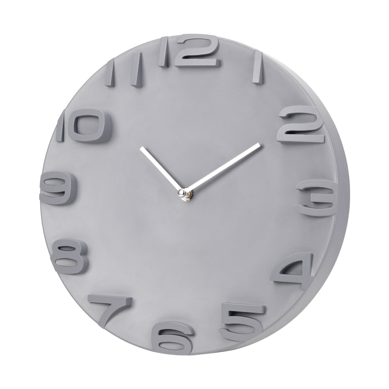 Slight angle view of grey round wall clock showing depth of raised 3D numerals and chunky plastic casing edge