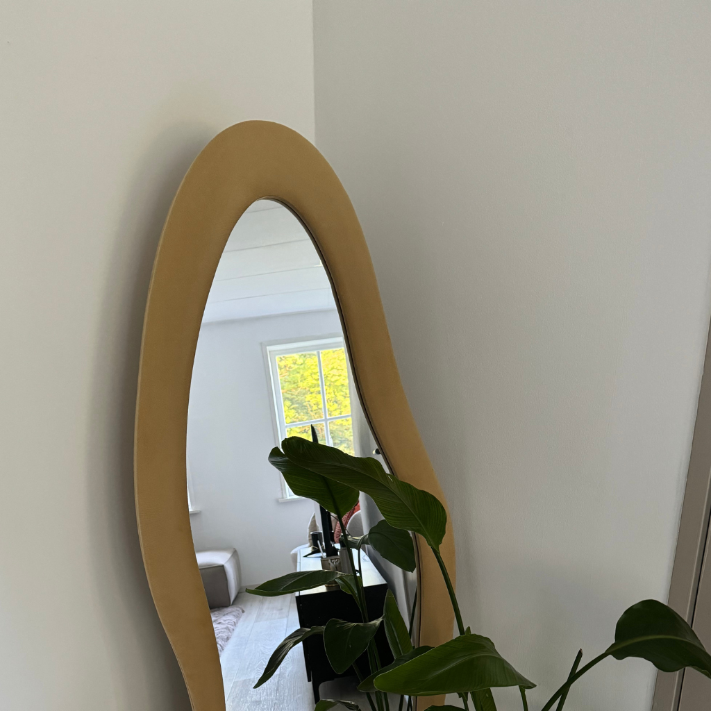 Upholstered asymmetrical standing mirror Seraphina