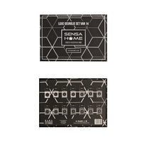 Black SensaHome fragrance oil set box showing front and back views, geometric silver pattern, 14 bottled oils visible in t…