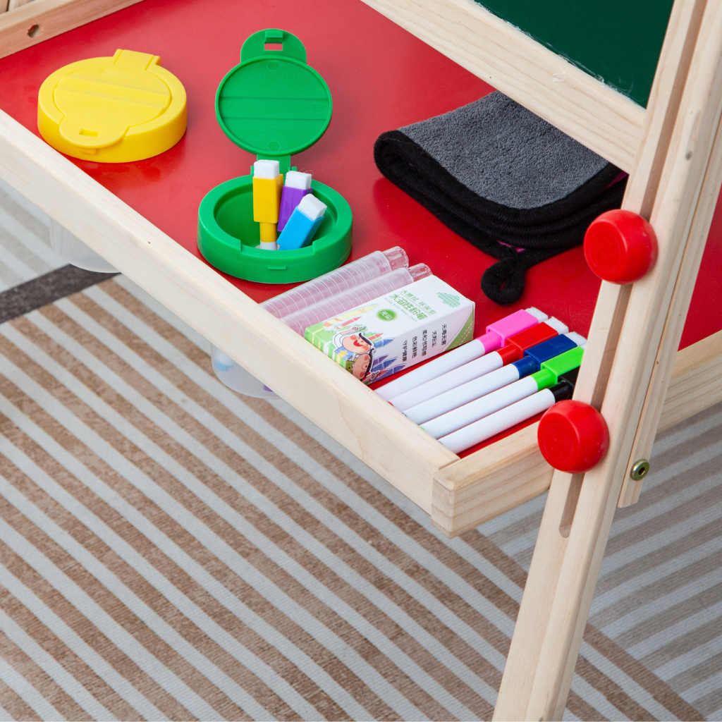 Wooden easel for children with chalkboard and whiteboard