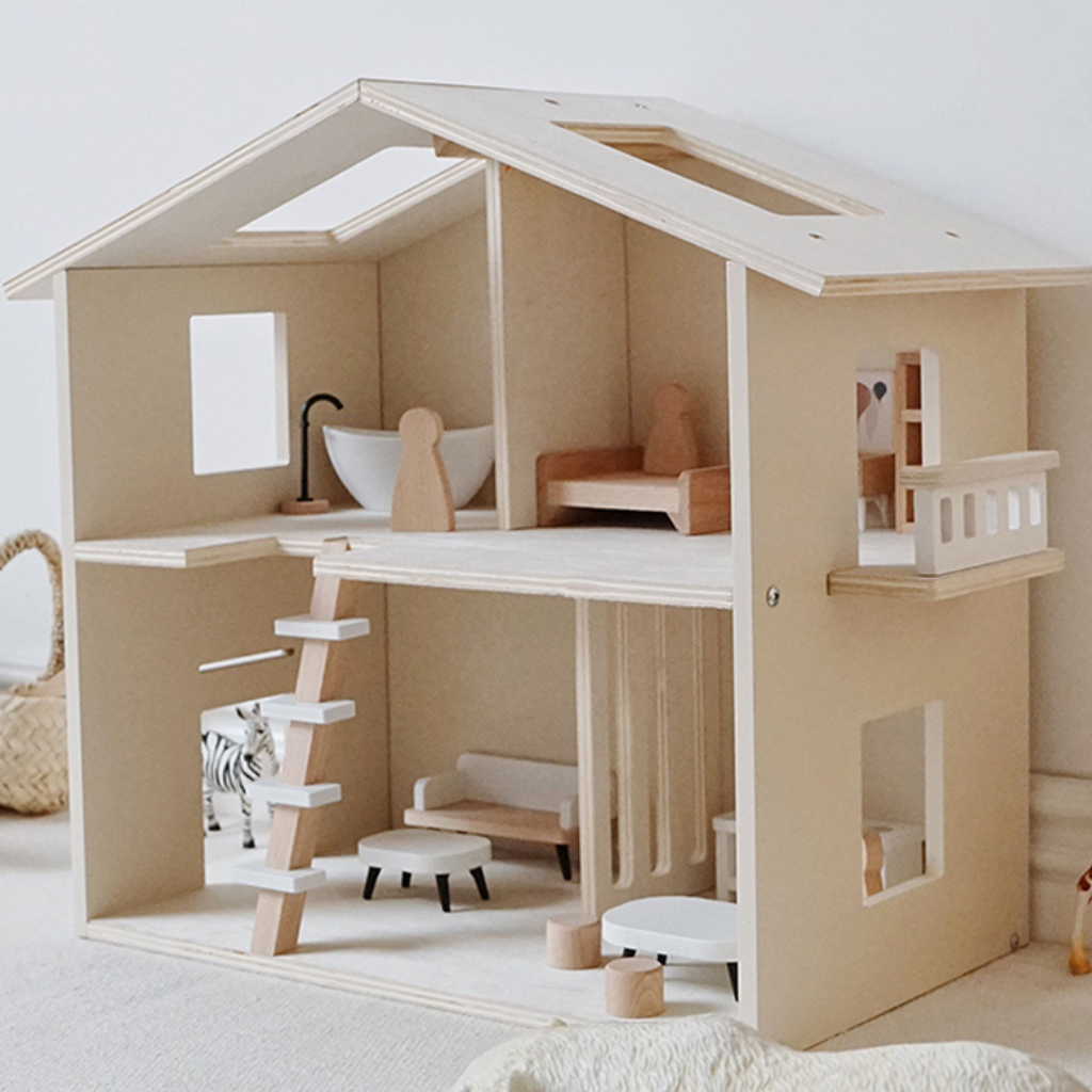 Casa de muñecas de madera con muebles.