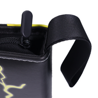 Close-up of black card binder top corner showing zipper puller, neon yellow lining, and wide black nylon carry handle
