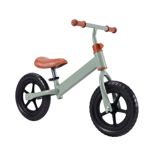 Green balance bike for kids