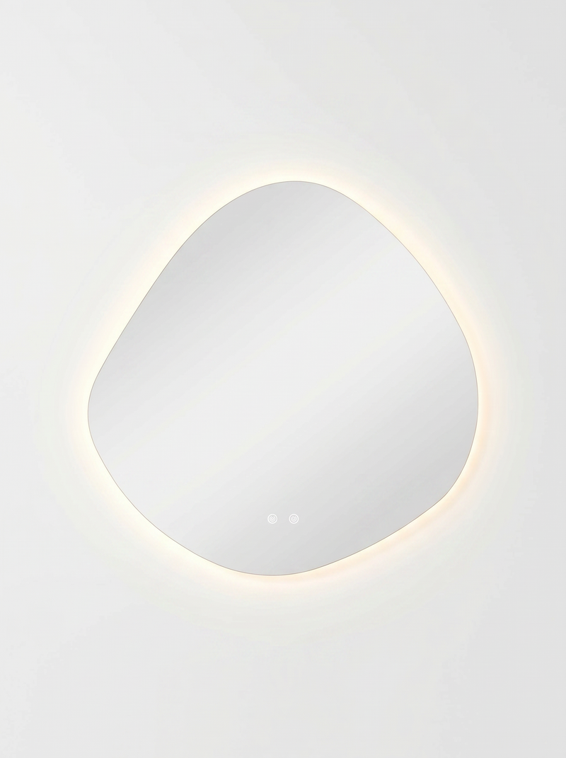 Asymmetrical LED backlit bathroom mirror with warm glow, two touch-control buttons visible on lower surface, white background