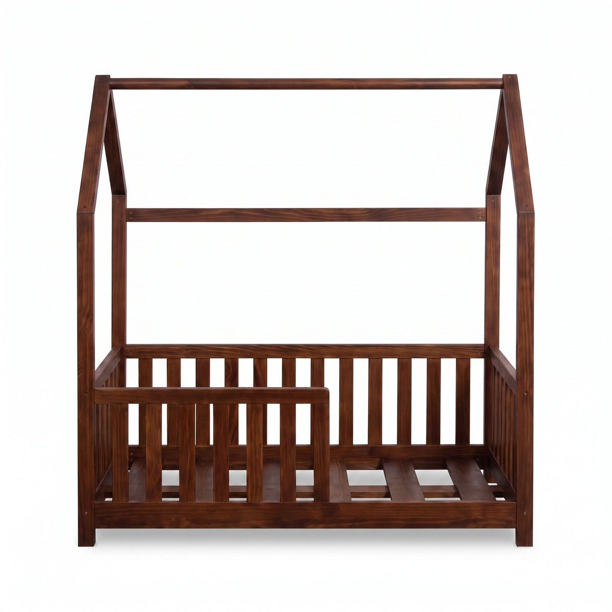 Walnut brown wooden children's house bed, straight-on front view, slatted safety rails on three sides, no mattress, white…