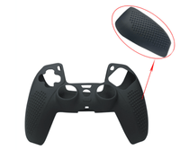 Black silicone PS5 controller cover front view with close-up inset highlighting raised dot grip texture on handle area