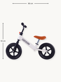 White New Speed balance bike side view with dimension annotations: 90 cm length, 55 cm height; tan saddle, black wheels