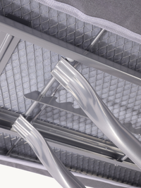 Close-up of curved silver steel steam unit holder bracket attached to the diamond-mesh ironing board underframe