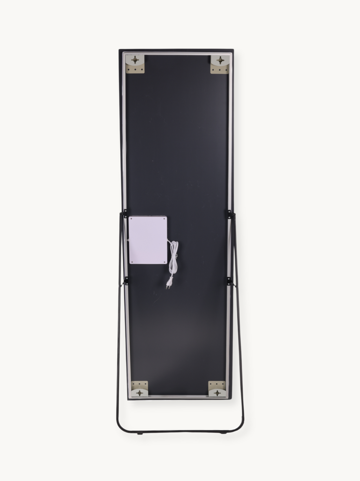Back panel of LED standing mirror showing black reverse side, white power cable, control box, black easel stand, and corne…