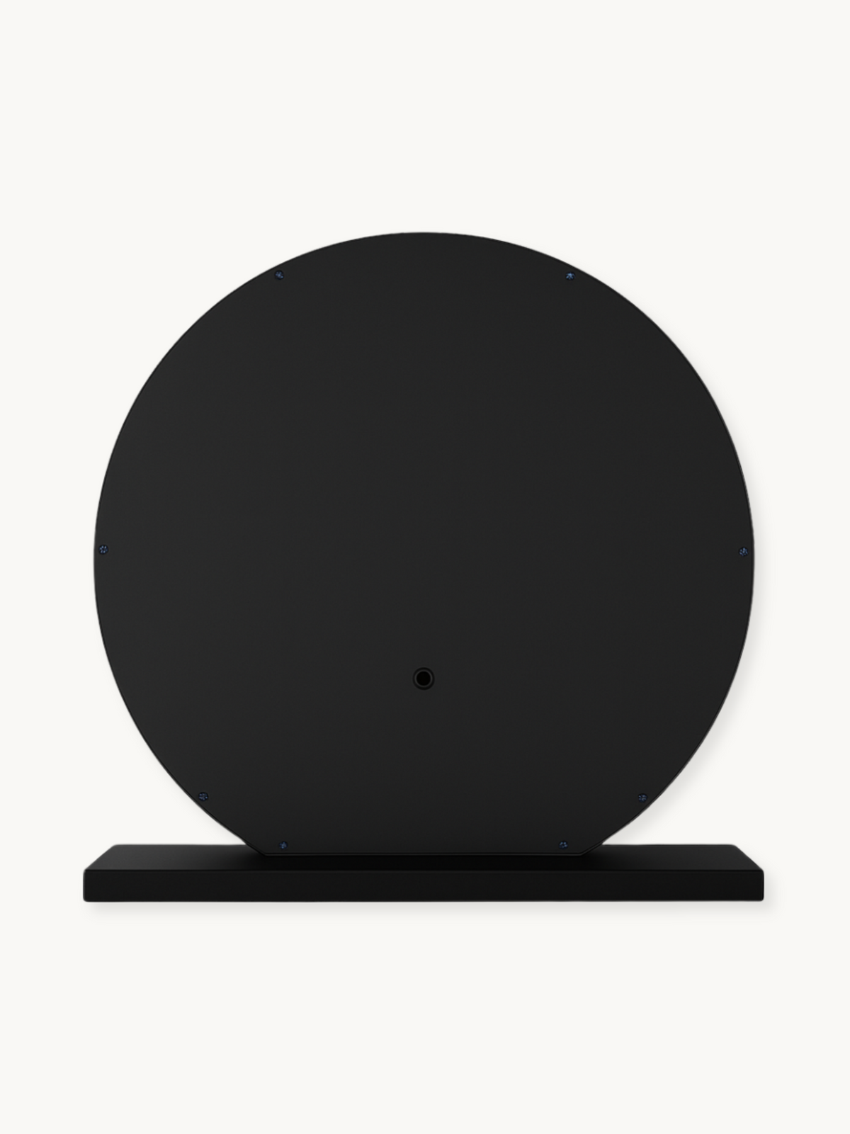 Back view of black round Hollywood vanity mirror on rectangular base, showing fixing screws and central mount point
