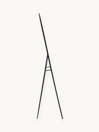 Black aluminium easel-style mirror stand viewed from the side, showing slim tripod legs and crossbar brace, no mirror visible