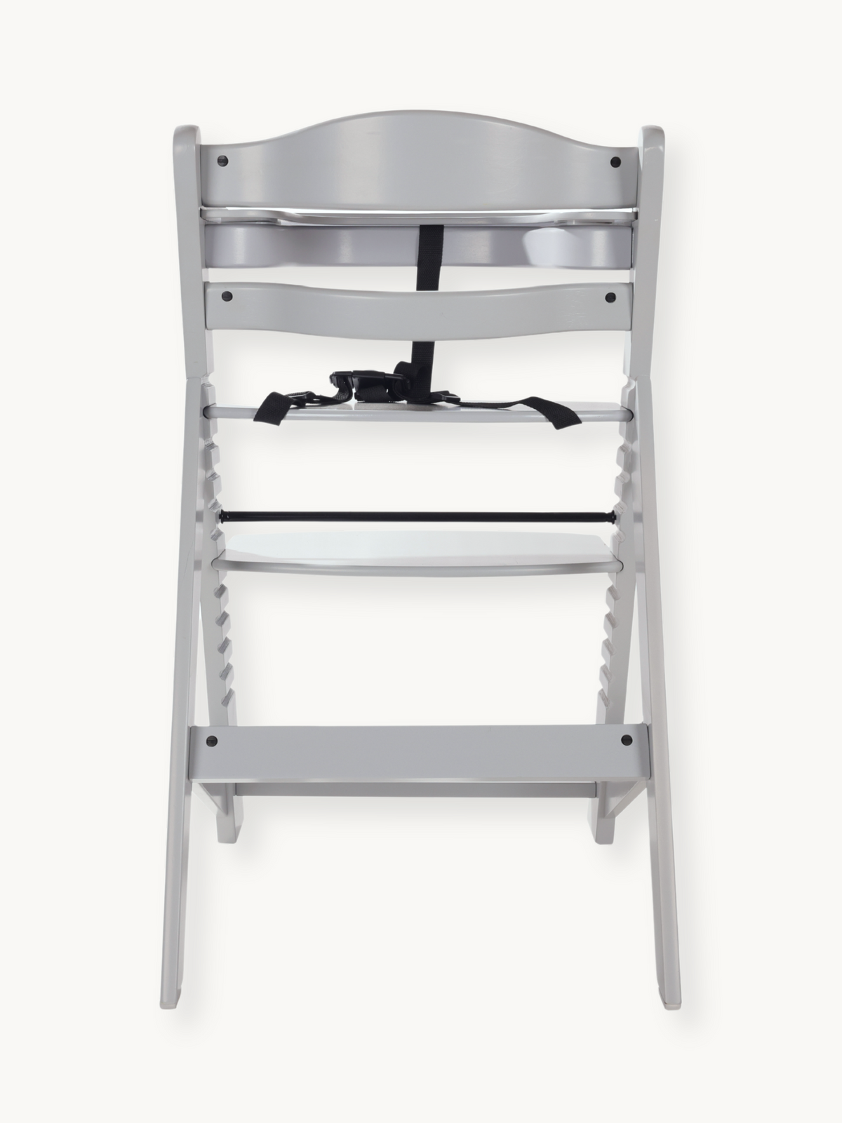 Grey wooden highchair rear view showing slatted back, black 5-point harness, notched adjustable seat and footrest rails