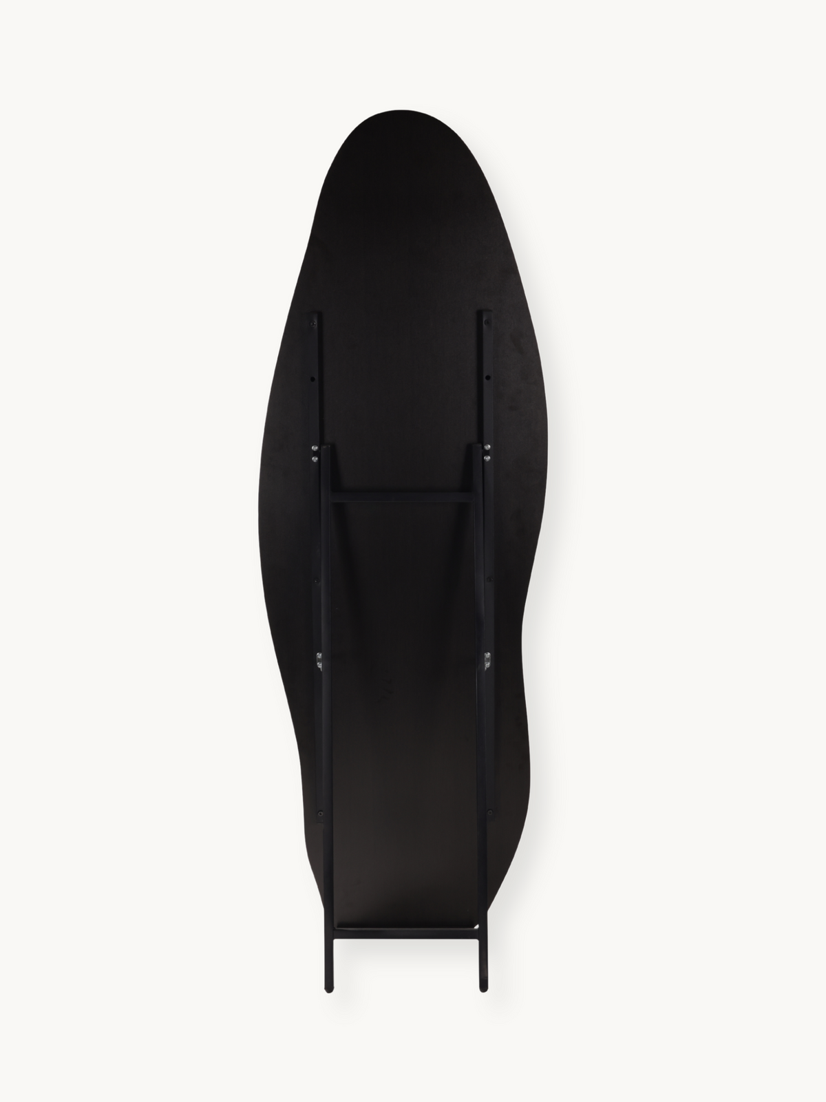 Back view of black asymmetric full-length mirror showing wooden support struts, hinge brackets, and slim black metal easel…