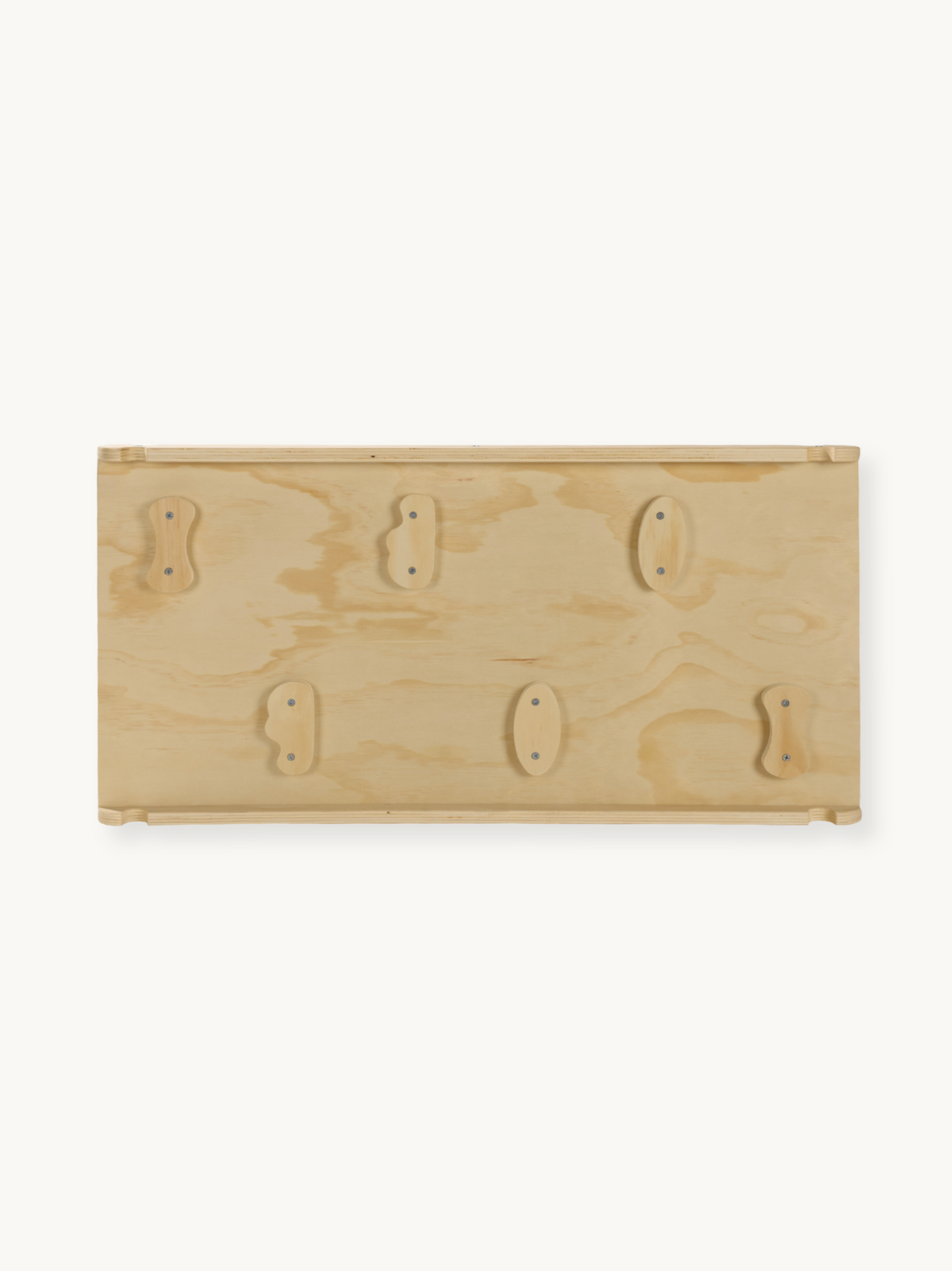 Underside of natural wood climbing panel showing six screw-fixed wooden holds in two rows, flat product view