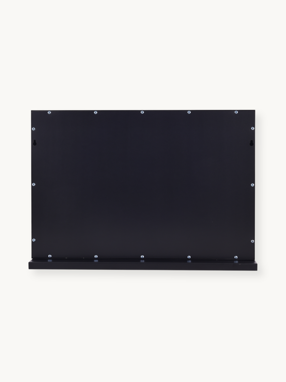 Back panel of black metal Hollywood vanity mirror showing evenly spaced silver screws and a narrow bottom shelf ledge