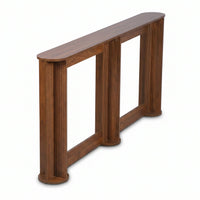 Angled rear-left view of walnut-finish console table showing fluted column legs, curved oval top, and open frame stretcher…