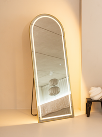 Oval standing mirror Cassian with LED lighting