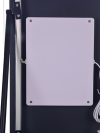 Back of LED mirror panel showing white rectangular control box with four corner screws and white power cable, mounted on d…