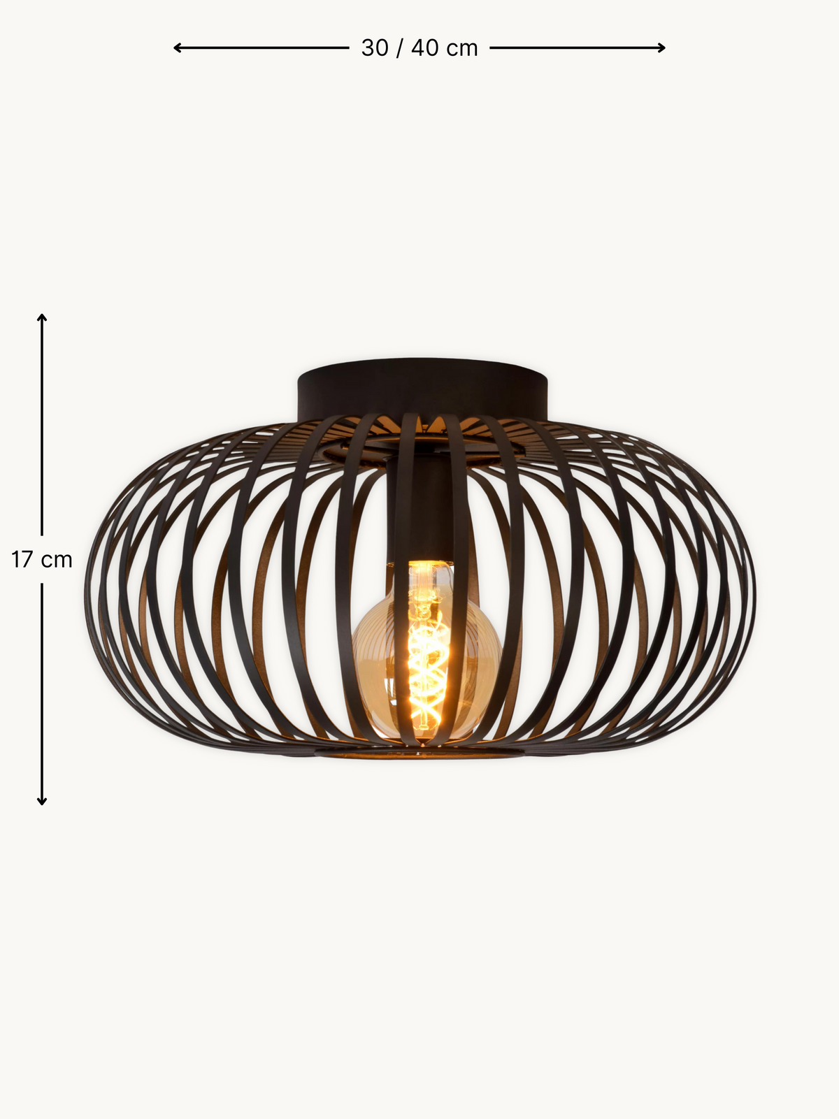 Black matte metal wire cage ceiling light with dimension annotations showing 30/40 cm width and 17 cm height, lit amber bu…