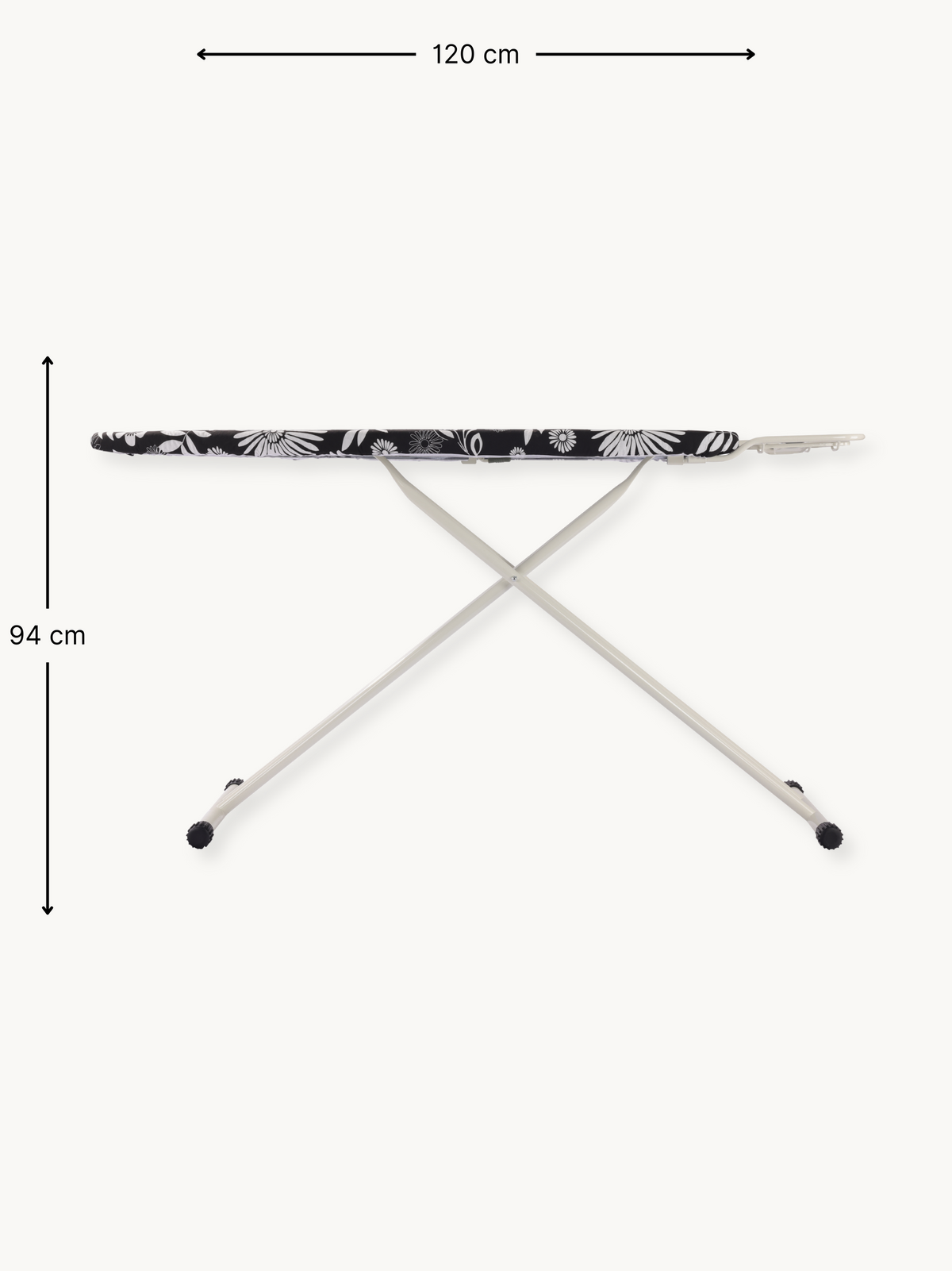 Ironing board front view with dimension annotations: 120 cm wide, 94 cm tall; black daisy-print cover on cream steel X-frame