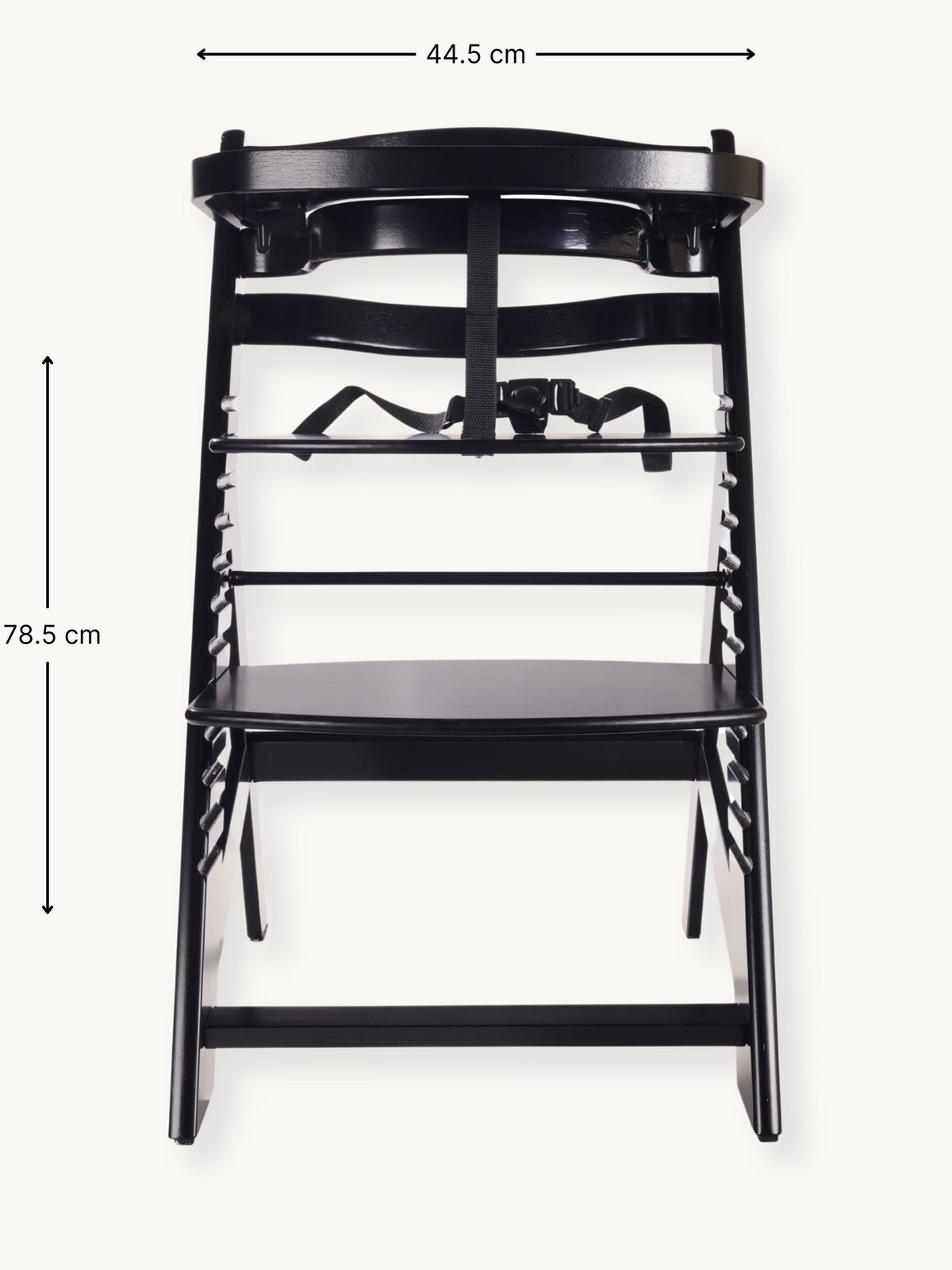 Black wooden highchair front view with dimension annotations: 44.5 cm wide, 78.5 cm tall; black safety harness visible at…