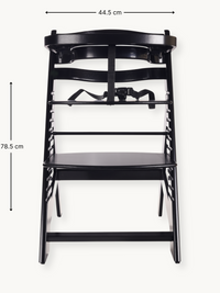 Black wooden highchair front view with dimension annotations: 44.5 cm wide, 78.5 cm tall; black safety harness visible at…