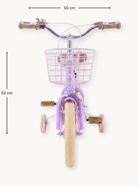 Front-view dimension diagram of purple Luna 12-inch girls' bike showing 50 cm width and 62 cm height annotations, with tra…