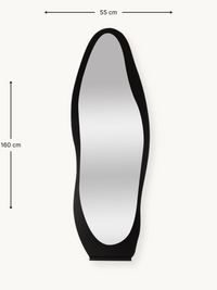 Black asymmetric full-length mirror with wavy wooden frame, front view with dimension annotations showing 160 cm height an…
