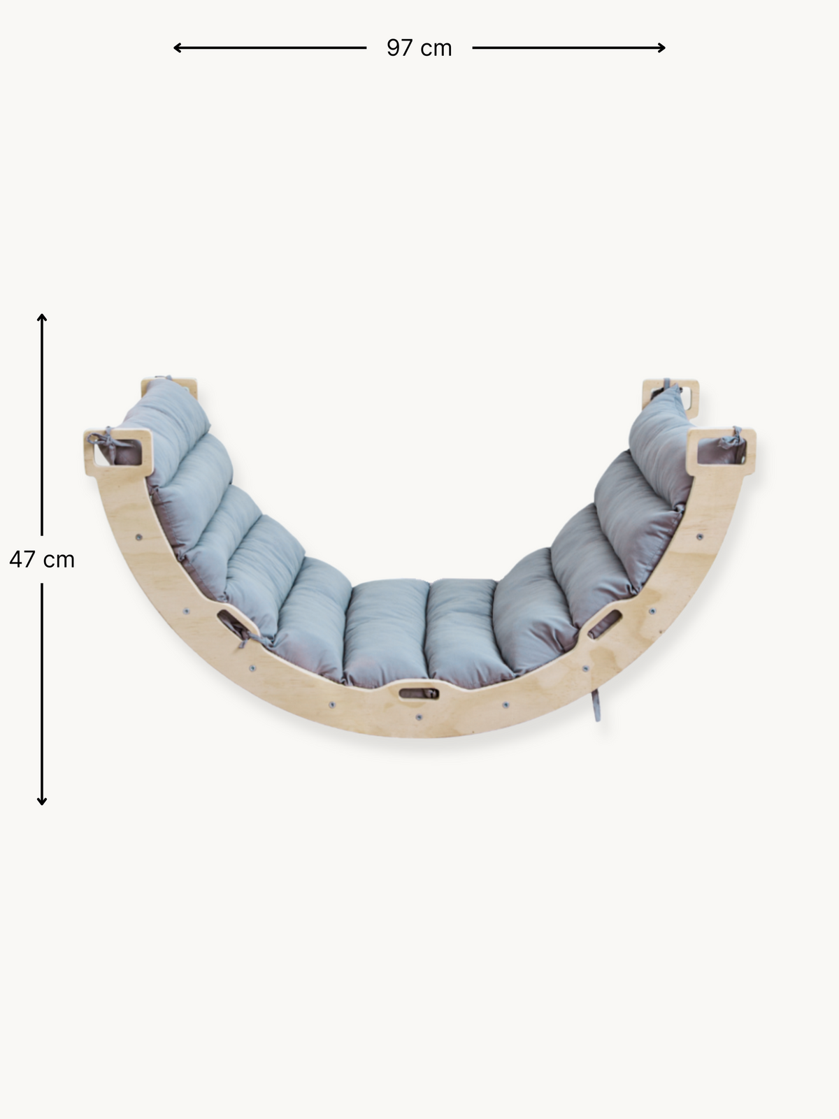 Top-down view of natural wood climbing arch rocker with grey tufted cushion, annotated 97 cm width and 47 cm height dimens…
