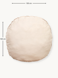 Overhead flat-lay of round cream white 100 cm floor cushion with dimension arrows showing 100 x 100 cm size