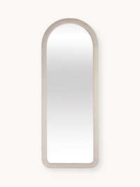 Full-length arched mirror Cleo with white suede velvet upholstered frame, front view on neutral background