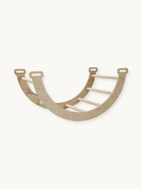 Natural wood climbing arch with ladder rungs, shown upright in U-shape against white background, cut-out handles visible o…