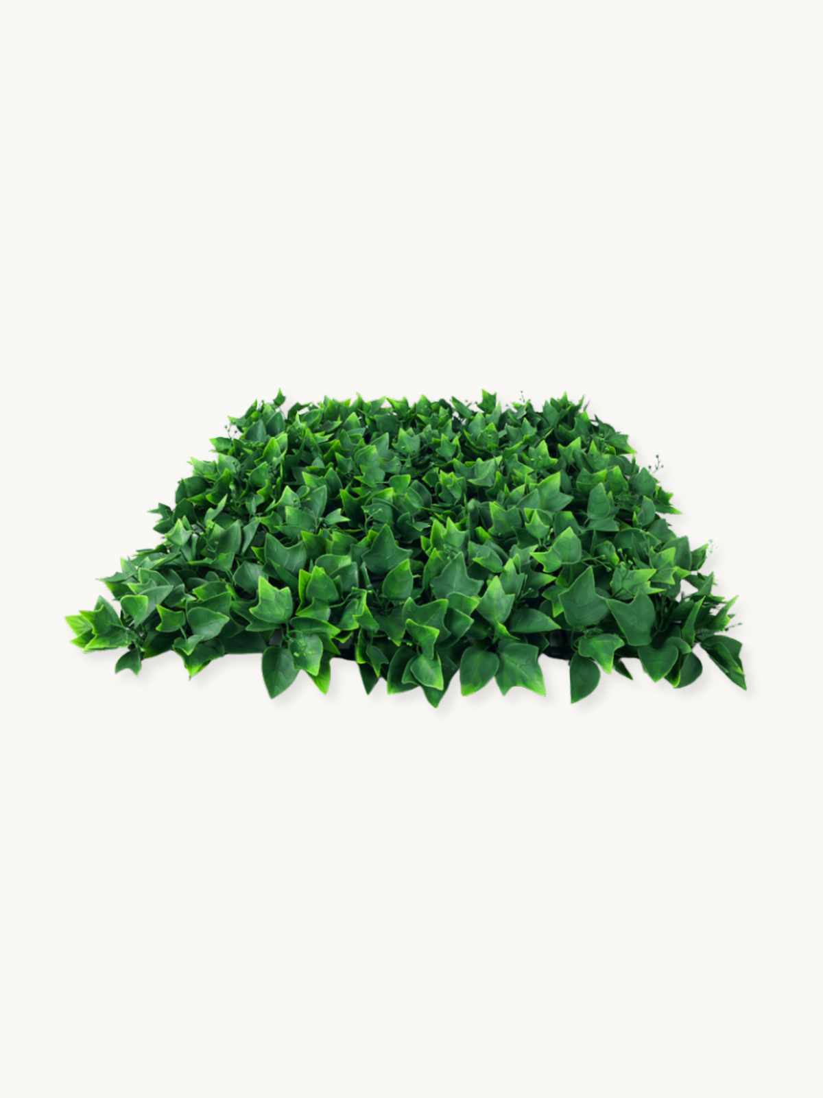 Angled top-down view of four artificial ivy-leaf panels arranged flat, showing dense layered green foliage coverage across…