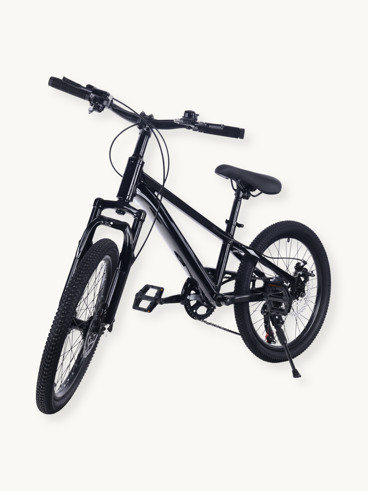 Black kids' mountain bike angled front-left view, showing knobbly tyres, front suspension fork, disc brakes, chain, pedals…