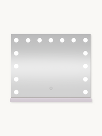 White Hollywood vanity mirror with 15 LED bulbs around three edges and a touch power button at the base, front view on whi…