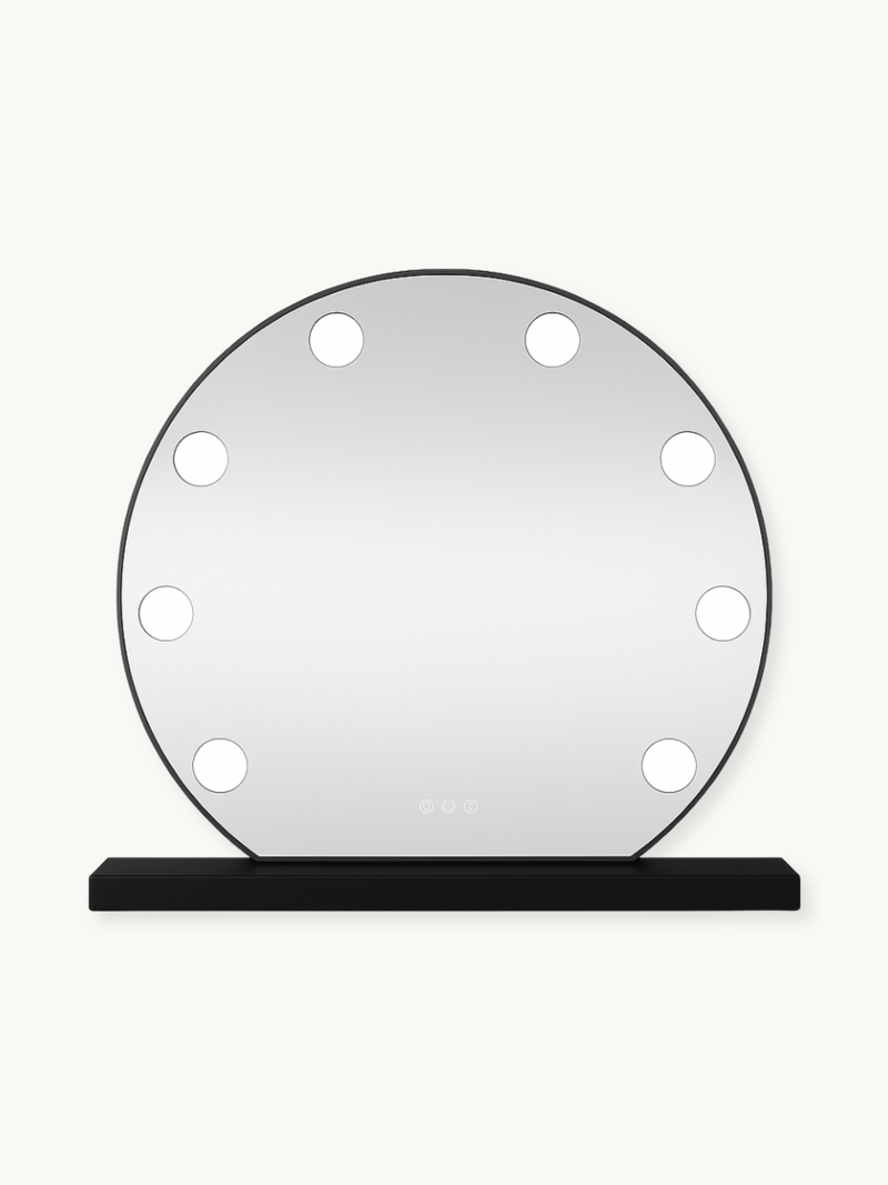 Round black-framed Hollywood vanity mirror with 10 lit bulbs around the edge, on a rectangular black base, front view