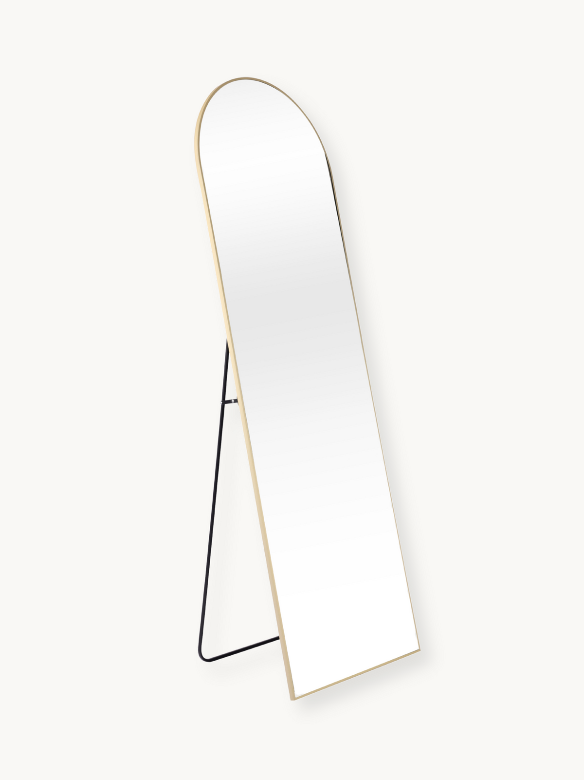 Angled side view of tall arched standing mirror, gold aluminium frame, black metal easel stand, plain background