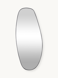 Tall asymmetric organic-shaped wall mirror with slim black PVC frame against off-white background, front view