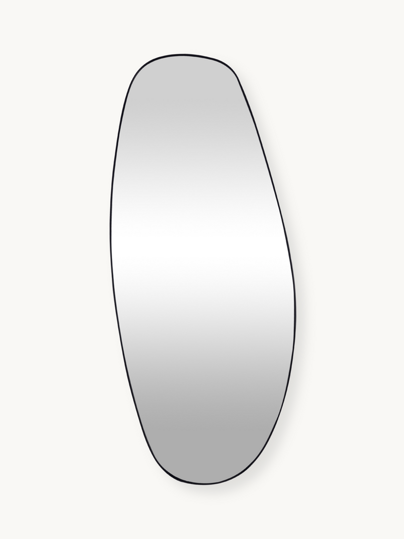 Tall asymmetric organic-shaped wall mirror with slim black PVC frame against off-white background, front view