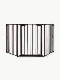 Black metal multi-panel baby safety gate fully extended, front view, showing central door section and angled side panels w…