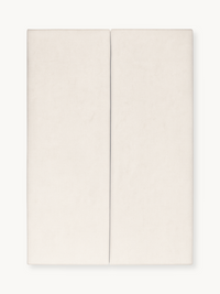 Cream white toddler mattress shown flat from above, two-panel split-top design with subtle textured fabric surface